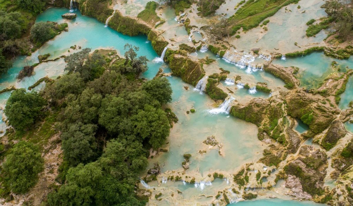 Waterfalls and Natural Pools with the blue water in Wadi Darbat